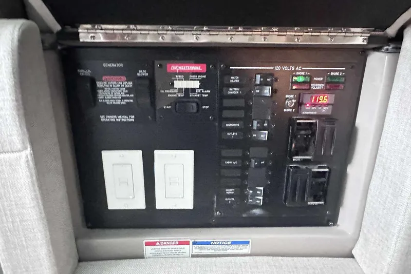 Slide: The Image of Electrical control panel on 2024 Sea Ray SLX 400 boat. - 47