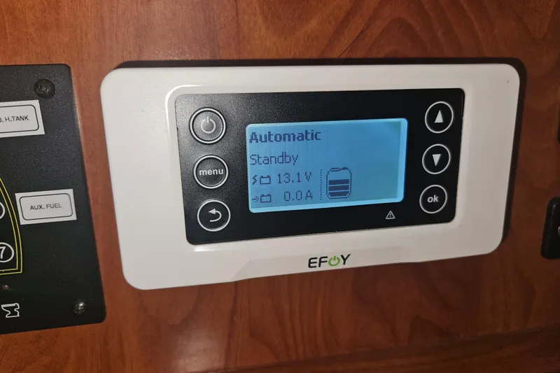 Slide: The Image of Steering wheel and controls of 2013 Marlow-Hunter 50 aft cabin sailboat. - 14