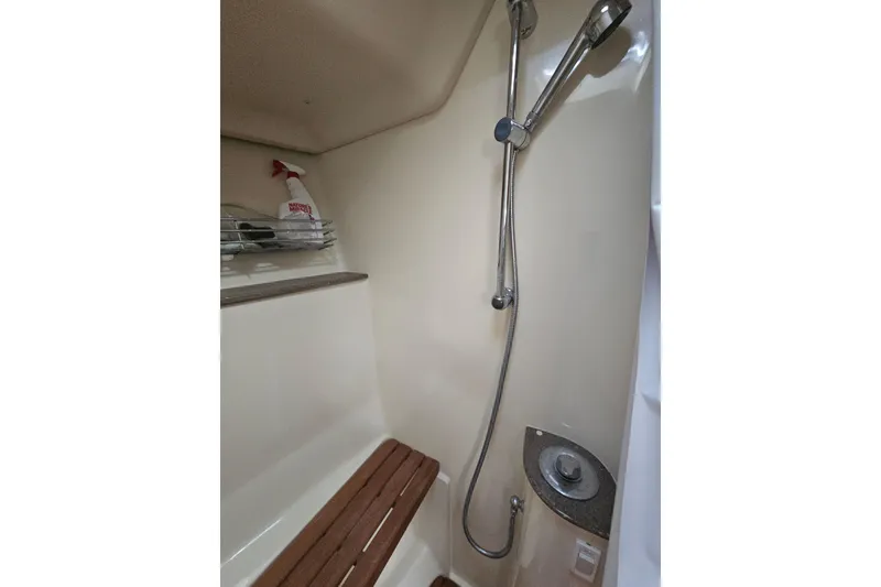 Slide: The Image of Bathroom in 2013 Marlow-Hunter 50 aft cabin yacht, featuring sink and toilet. - 39