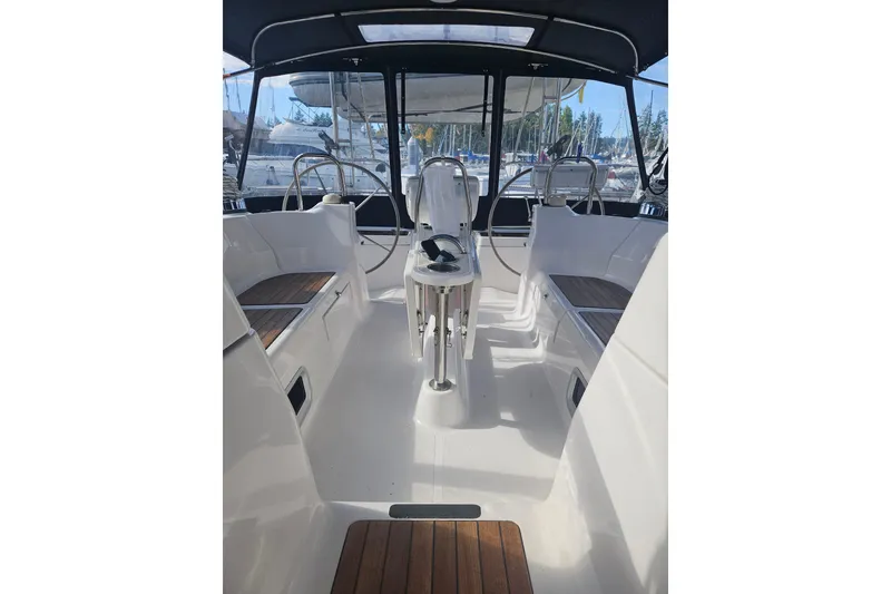 Slide: The Image of 2013 Marlow-Hunter 50 aft cabin shower area with wooden seat and storage shelf. - 47