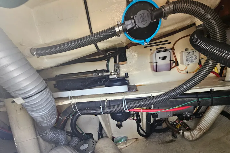 Slide: The Image of Storage compartment of 2013 Marlow-Hunter 50 aft cabin with ropes and equipment. - 60