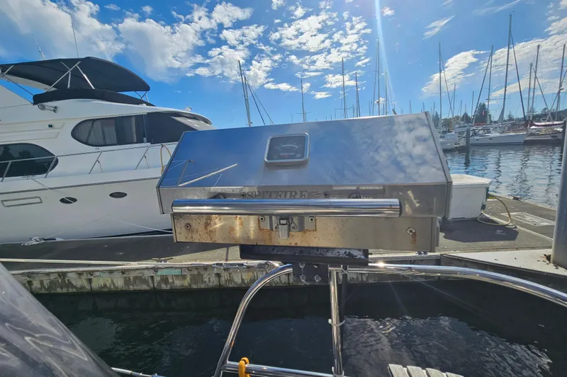 Slide: The Image of Close-up of Marlow-Hunter 50 aft cabin boat hardware, 2013 model, near water. - 61