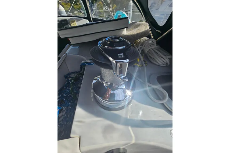 Slide: The Image of Close-up of a 2013 Marlow-Hunter 50 aft cabin sailboat's furling system on deck. - 63