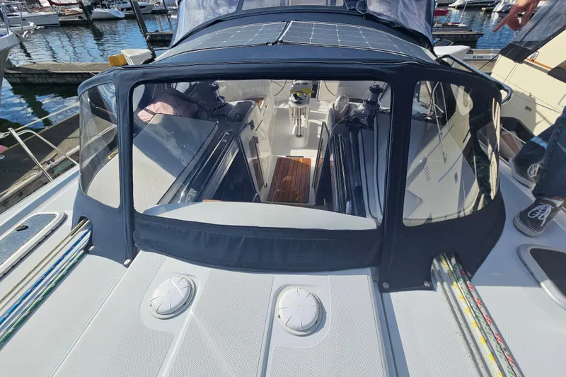 Slide: The Image of Battery compartment of 2013 Marlow-Hunter 50 aft cabin with wiring and wooden supports. - 68