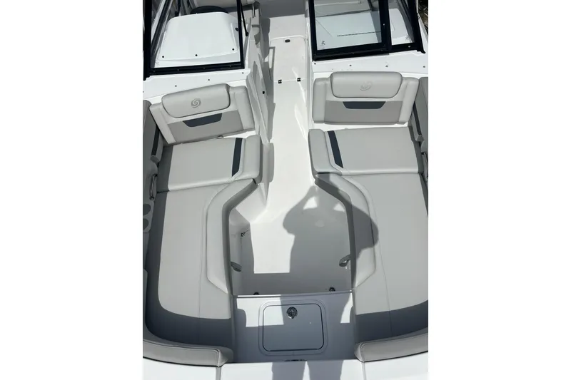 Slide: The Image of 2026 Hurricane SunDeck 235 OB boat interior with spacious seating and modern design. - 11
