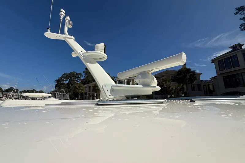 Slide: The Image of Radar equipment on 2023 Sabre 43 Salon Express yacht under clear blue sky. - 21