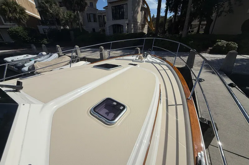Slide: The Image of 2023 Sabre 43 Salon Express yacht deck with sleek design and modern features. - 24