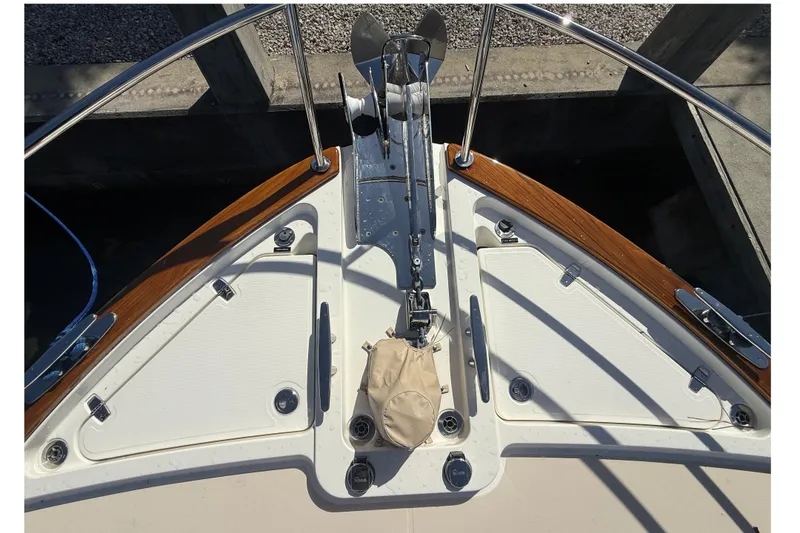 Slide: The Image of Bow of 2023 Sabre 43 Salon Express with anchor and teak accents. - 27
