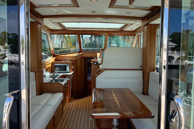 Slide: The Image of Interior of 2023 Sabre 43 Salon Express yacht with elegant wood finish. - 37