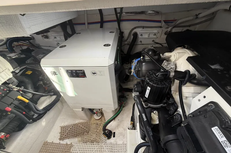 Slide: The Image of Engine room of 2023 Sabre 43 Salon Express, showcasing mechanical components and systems. - 50