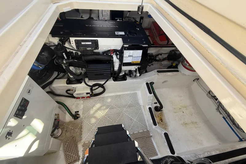 Slide: The Image of Engine compartment of 2023 Sabre 43 Salon Express, showcasing mechanical components and layout. - 52