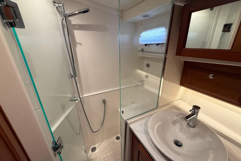 Slide: The Image of Luxurious bathroom in 2023 Sabre 43 Salon Express yacht with modern shower and sink. - 71
