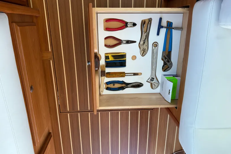 Slide: The Image of Drawer with tools inside a 2023 Sabre 43 Salon Express yacht. - 90
