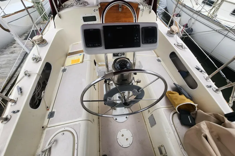 Slide: The Image of Anchor and rope storage on 1982 Pearson 323 sailboat deck. - 16