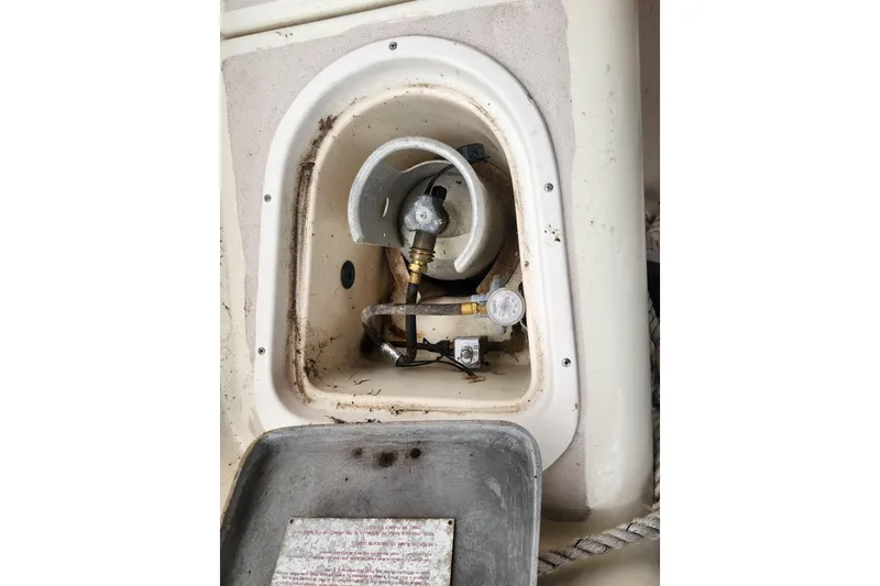 Slide: The Image of Cockpit of 1982 Pearson 323 sailboat with steering wheel and navigation equipment. - 19