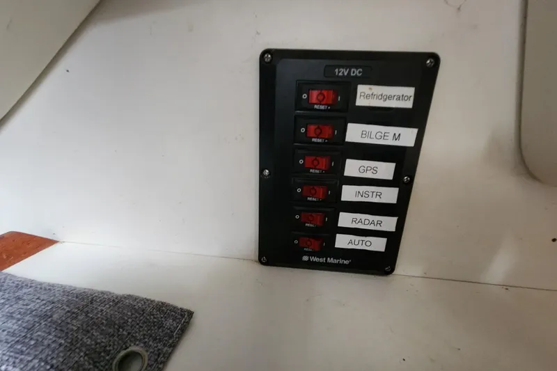 Slide: The Image of VHF radio on 1982 Pearson 323 sailboat, featuring Lowrance Link-8 model. built in above the nav. station on the starboard side of boat - 42
