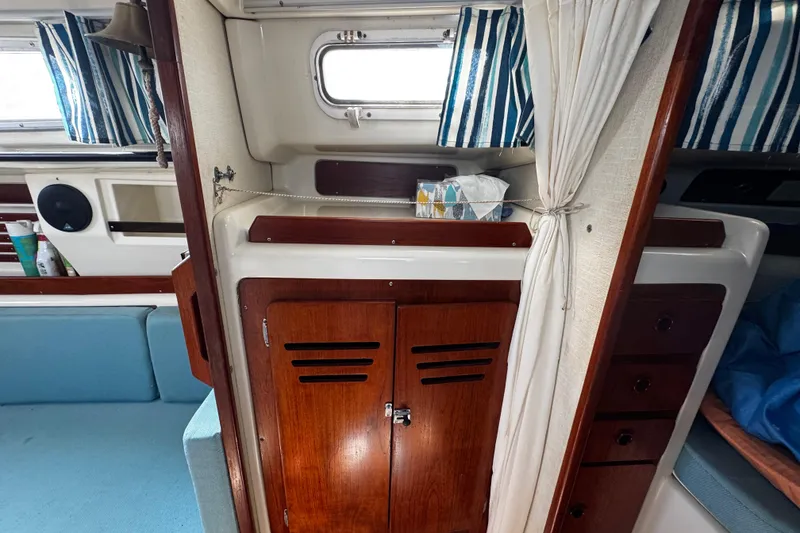 Slide: The Image of Larger view of closet storage opposite the head area - 55