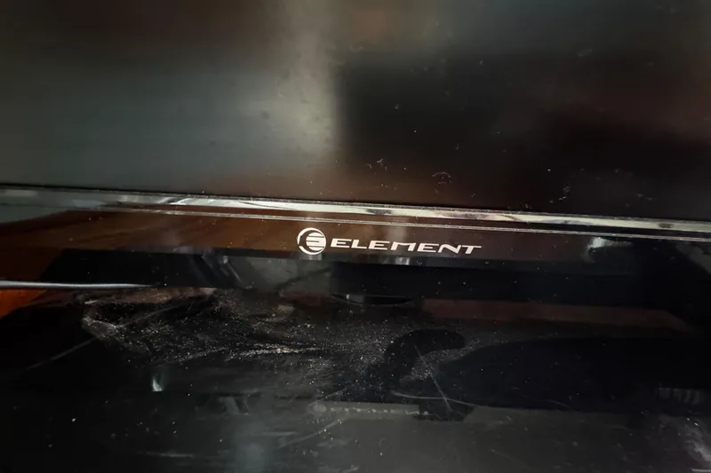 Slide: The Image of Element flat screen TV with remote - 71