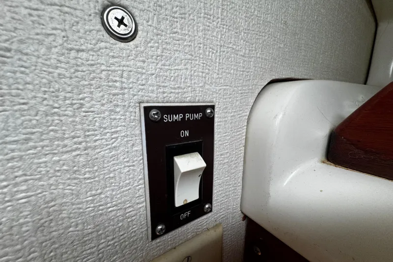 Slide: The Image of Sump pump switch on 1982 Pearson 323 boat interior wall. - 50