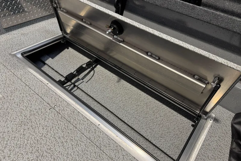 Slide: The Image of Open storage compartment in 2026 Lund 200 Heavy Gauge boat, showcasing interior design. - 20