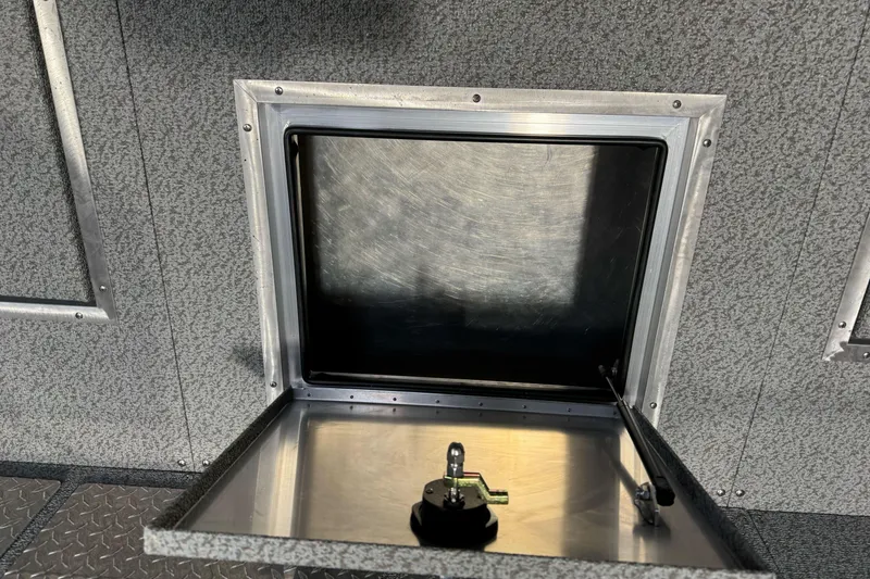 Slide: The Image of Open storage compartment in 2026 Lund 200 Heavy Gauge boat interior. - 21