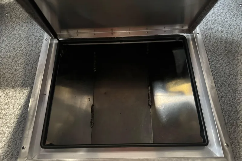 Slide: The Image of Open storage compartment in 2026 Lund 200 Heavy Gauge boat. - 27
