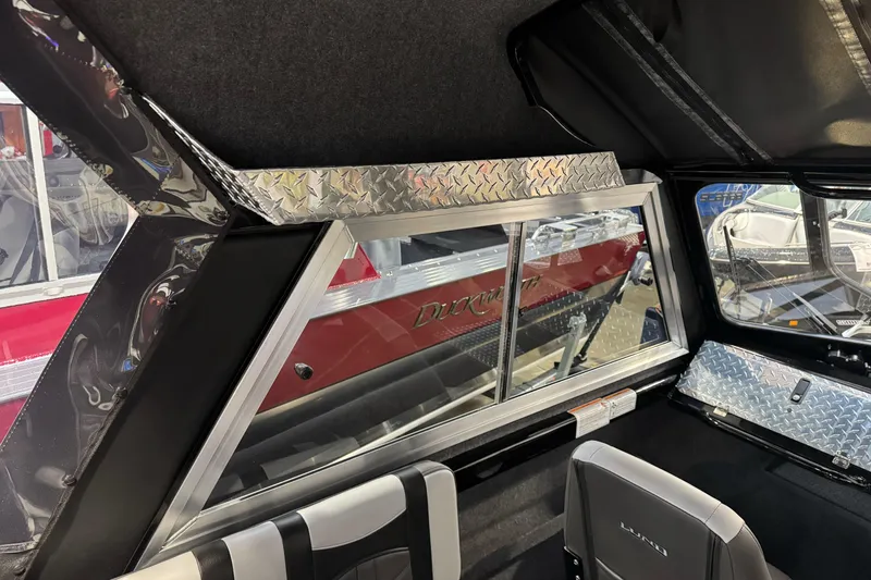 Slide: The Image of Interior of 2026 Lund 200 Heavy Gauge boat with diamond plate accents and seating. - 32
