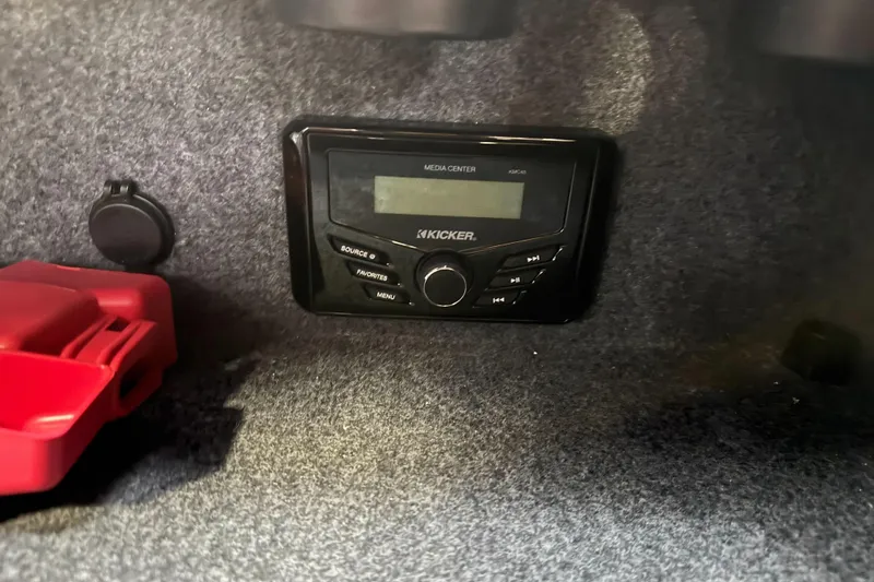 Slide: The Image of Kicker media center in 2026 Lund 200 Heavy Gauge boat interior. - 41