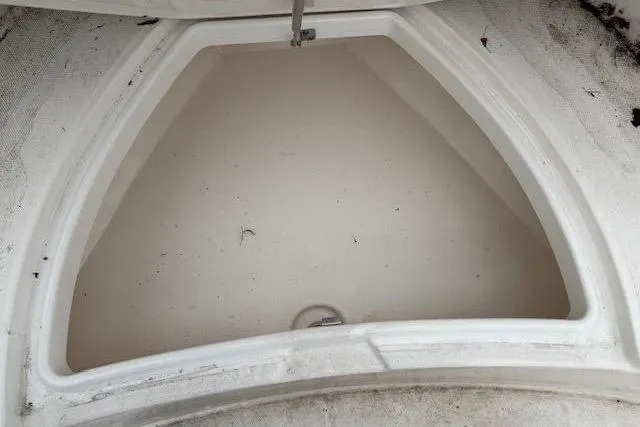 Slide: The Image of Storage compartment in Everglades 230 Center Console boat, 2013 model. - 16