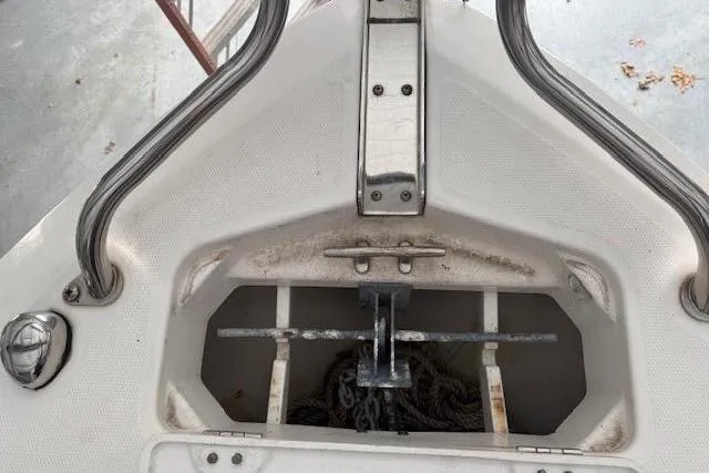Slide: The Image of Anchor compartment of a 2013 Everglades 230 Center Console boat. - 17