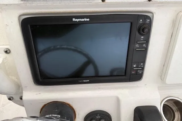Slide: The Image of Raymarine display on 2013 Everglades 230 Center Console boat dashboard. - 21