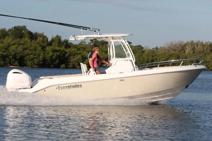 Slide: The Image of Manufacturer Provided Image: 2015 Everglades 230 Center Console boat cruising on a calm lake. - 40