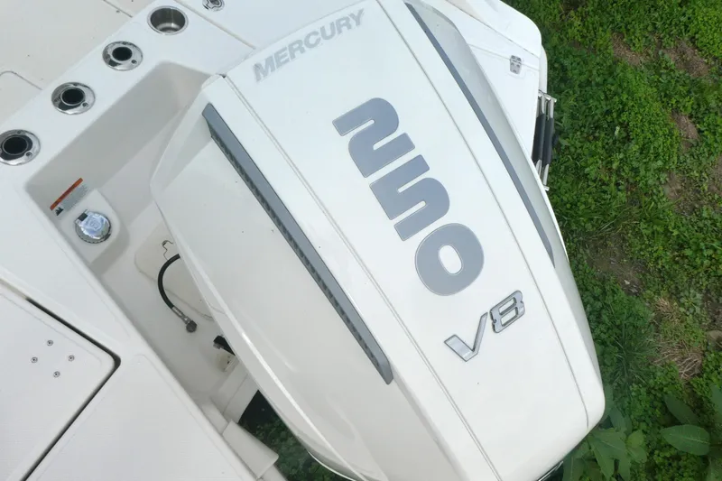 Slide: The Image of 2024 Boston Whaler 220 Dauntless with Mercury V8 engine, viewed from above. - 3