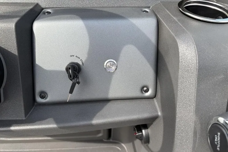 Slide: The Image of Dashboard of 2026 Sun Tracker Party Barge 18 DLX with ignition key. - 17