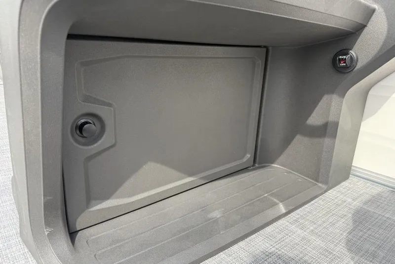 Slide: The Image of Storage compartment in 2026 Sun Tracker Party Barge 18 DLX pontoon boat. - 18