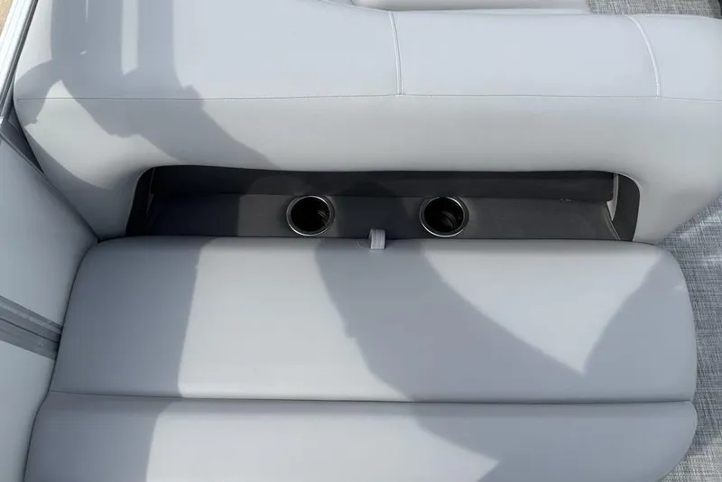 Slide: The Image of 2026 Sun Tracker Party Barge 18 DLX boat seat with cup holders. - 21