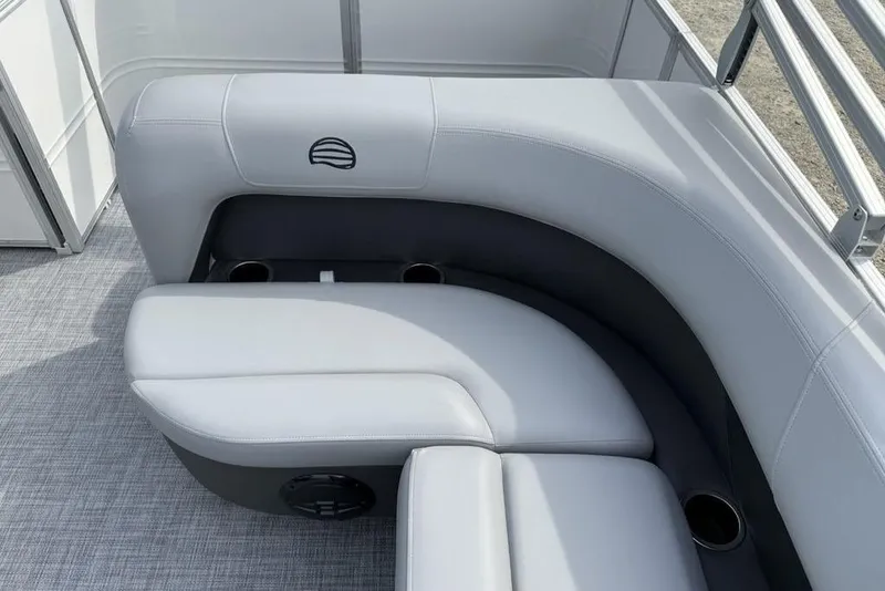 Slide: The Image of 2026 Sun Tracker Party Barge 18 DLX, gray seating with cup holders on a pontoon boat. - 24