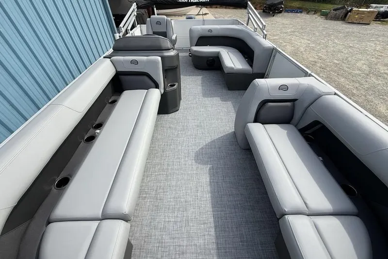 Slide: The Image of 2026 Sun Tracker Party Barge 18 DLX interior with spacious seating and modern design. - 27