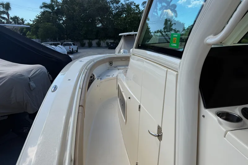 Slide: The Image of 2022 Scout 355 LXF boat deck with sleek design and modern features. - 21