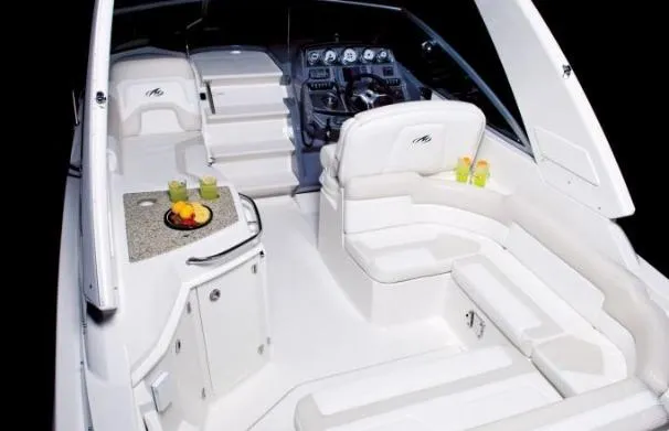 Slide: The Image of 2016 Monterey 295 Sport Yacht on stands, showing propeller and stern details. - 2