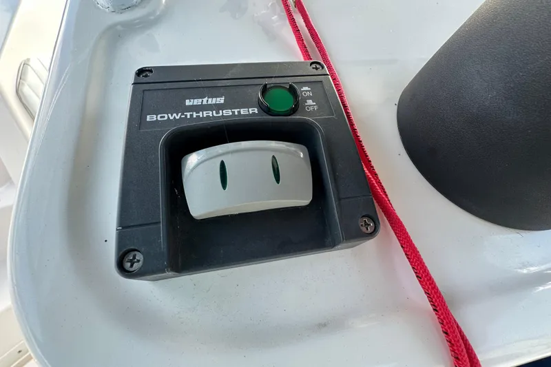 Slide: The Image of 1999 Intrepid 339 boat dashboard with steering wheel, controls, and navigation instruments. - 5