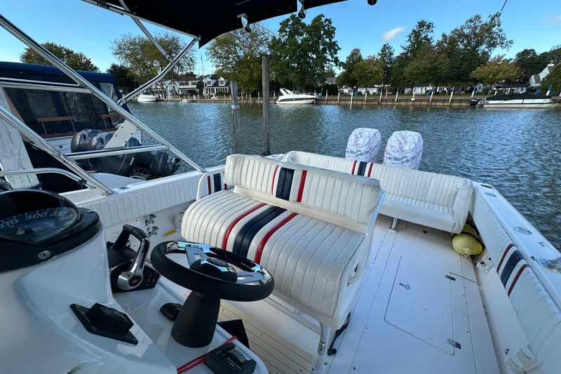 Slide: The Image of Vetus bow thruster control on 1999 Intrepid 339 boat dashboard. - 7