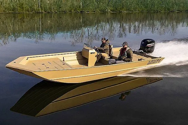 The Image of 2026 Lowe Roughneck 2070SC boat on trailer, camo design, parked outside dealership. - 0