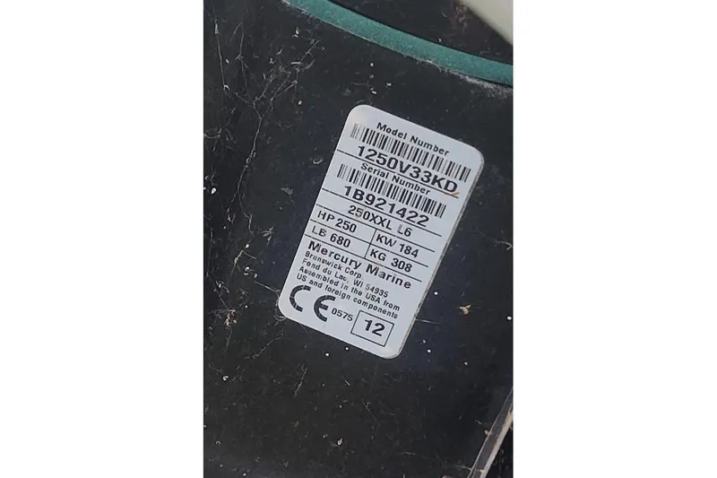 Slide: The Image of Label on a 2012 Boston Whaler 280 Outrage, displaying model and serial numbers. - 53