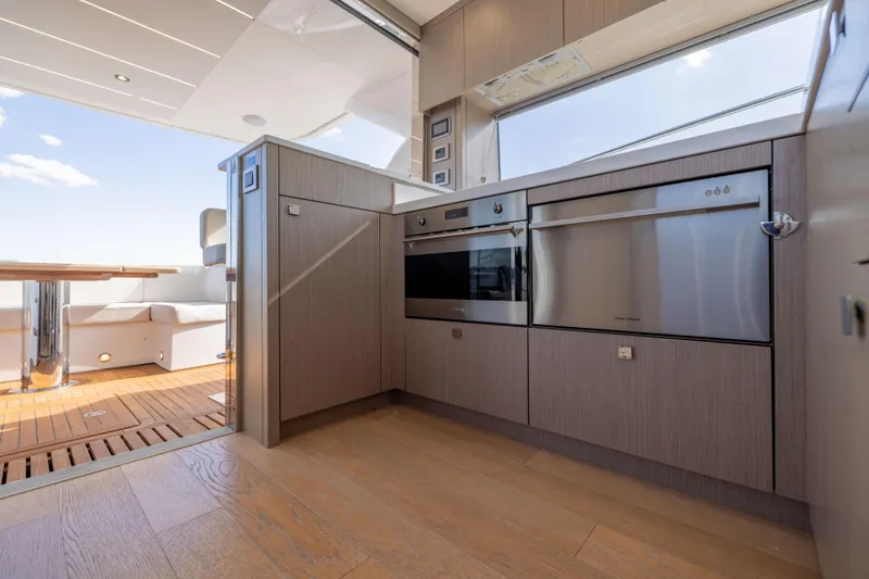 Slide: The Image of Luxurious kitchen interior of 2018 Sunseeker Manhattan 52 yacht with modern appliances. - 24