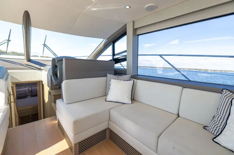Slide: The Image of Luxurious interior of 2018 Sunseeker Manhattan 52 yacht with elegant seating and ocean view. - 31