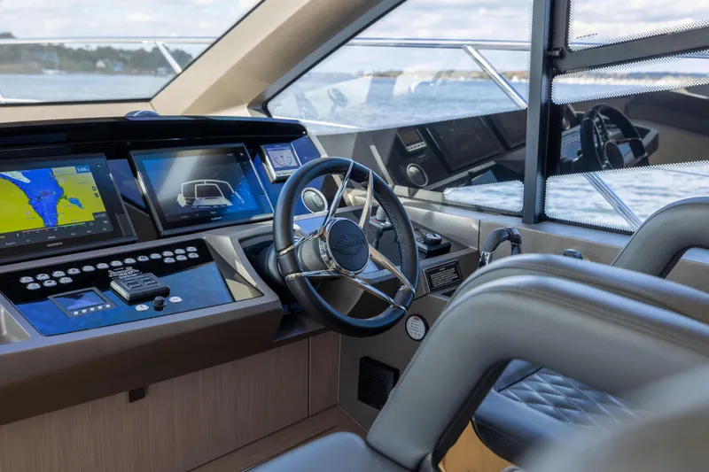 Slide: The Image of Helm of 2018 Sunseeker Manhattan 52 yacht with modern navigation displays. - 36