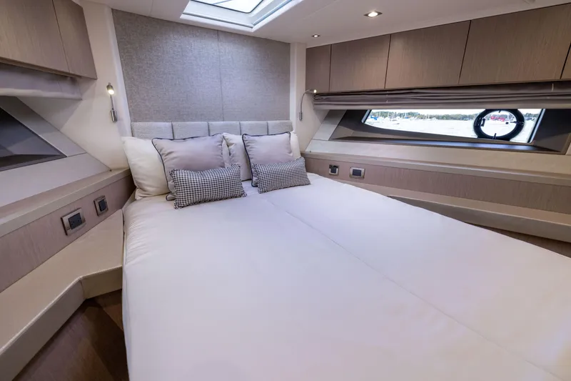 Slide: The Image of Luxurious bedroom interior of 2018 Sunseeker Manhattan 52 yacht with elegant bedding. - 41
