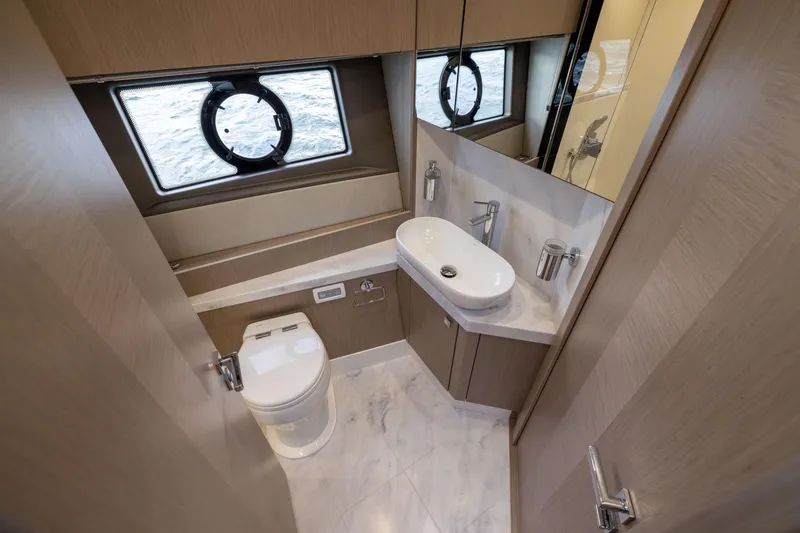 Slide: The Image of Luxurious bathroom in 2018 Sunseeker Manhattan 52 yacht with modern fixtures and ocean view. - 45