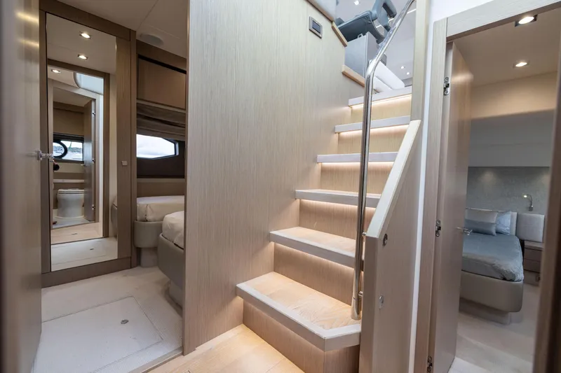 Slide: The Image of Luxurious interior of 2018 Sunseeker Manhattan 52 yacht with modern staircase and bedrooms. - 46